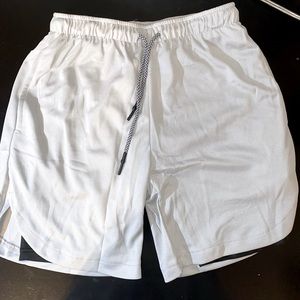 New men’s atheletic shorts. Size Medium in the color light grey